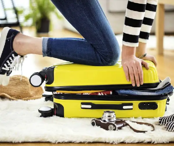 Foolproof hacks for how to pack a suitcase on your next family trip