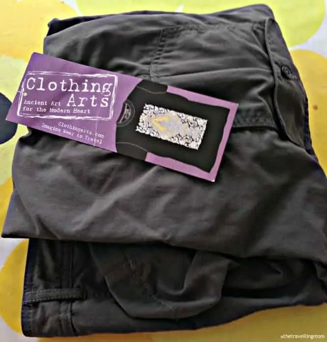 pair of folded Clothing Arts Pick-Pocket Proof pants