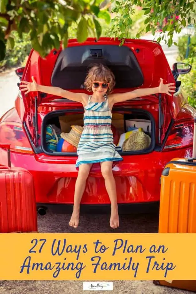 girl sitting among suitcases in car