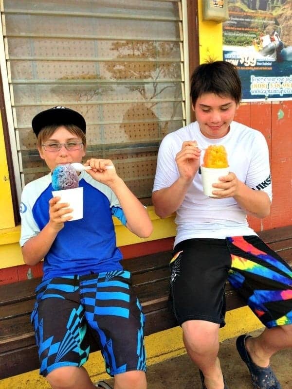 two boys eating shave ice 