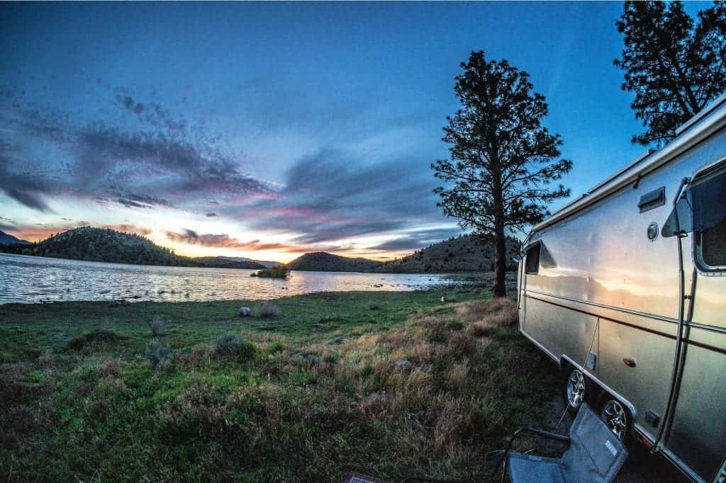 airstream overlooking lake camping in bc