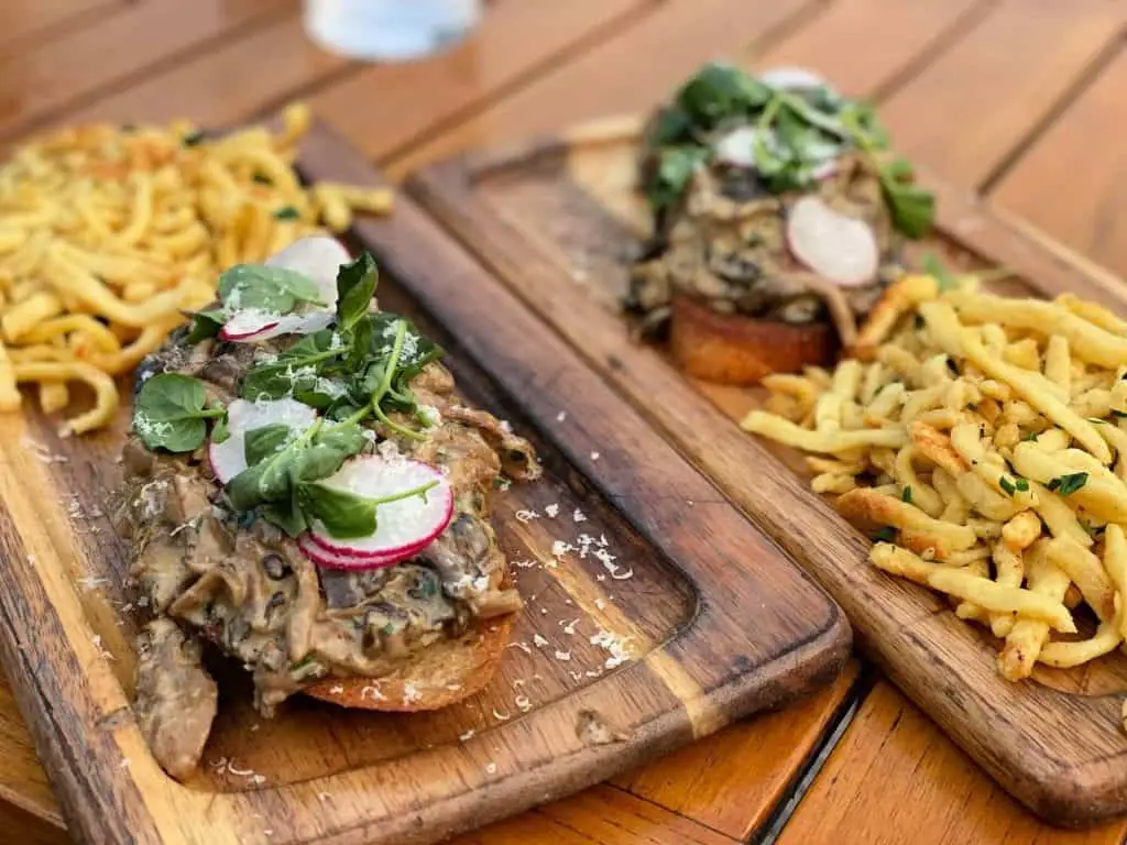 mushrooms on toast with fries in banff restaurant