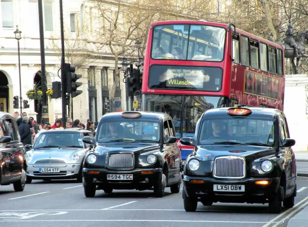 london taxis and red double-decker bus