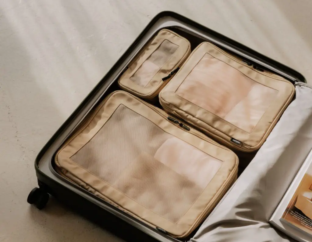 monos packing cubes in suitcase