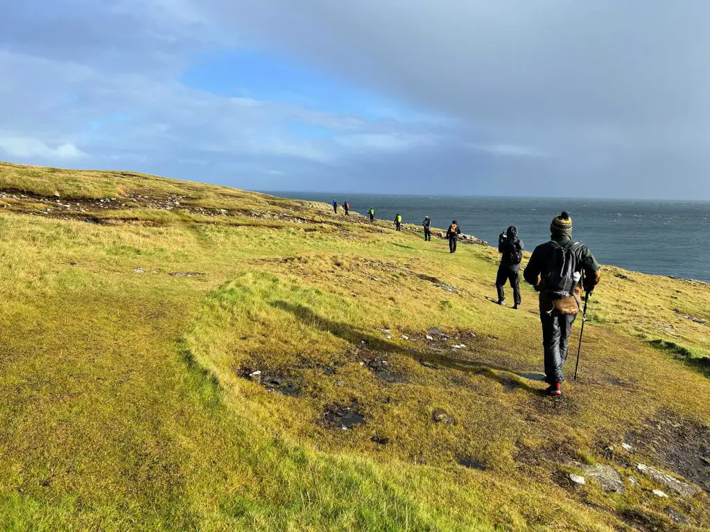 group hiking on the orkney islands