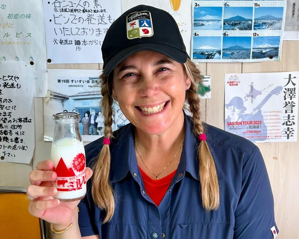 Claudia laroye happy with milpis drink on rishiri
