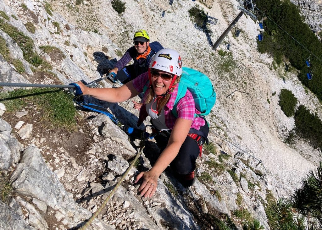 couple on steep via ferrata wall