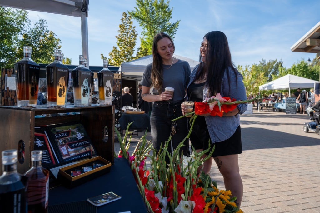two women at gather local market in saskatoon