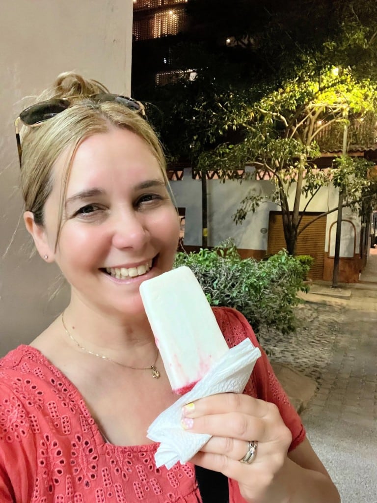 claudia eating a frozen paleta popsicle