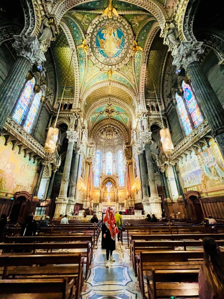 basilica of lyon impresses with its towering columns and artwork