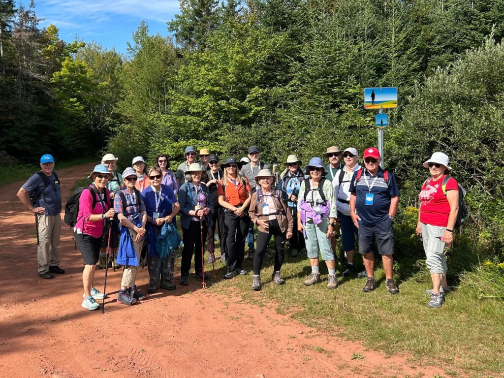 group poses on island walk pei